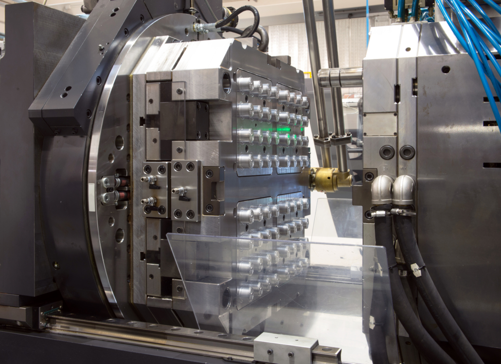 Injection molding machines in a large factory Injection molding machines in a large factory